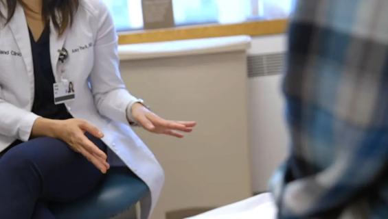 Doctor talking to patient