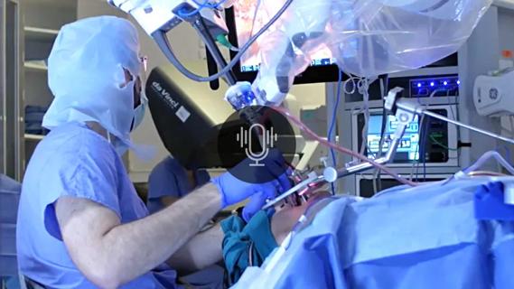 Surgeons operating robotically