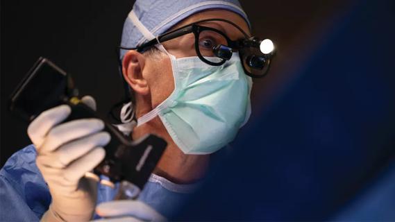 neurosurgeon performing minimally invasive spine operation