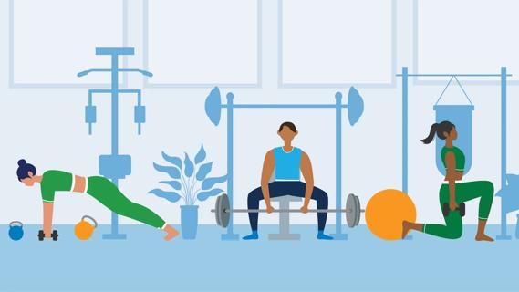 People working out with weights in a gym