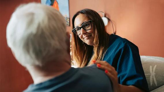 Hospice nurse with patient