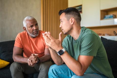 Two people deeply engaged in conversation