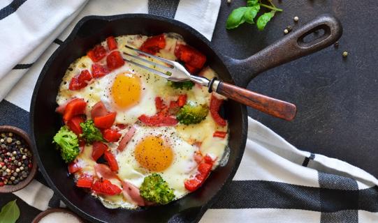 Eggs and veggies in a cast iron skillet