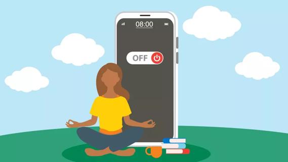Person doing yoga outside, with oversized smartphone turned off in backround