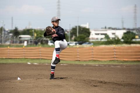 Young pitcher throwing