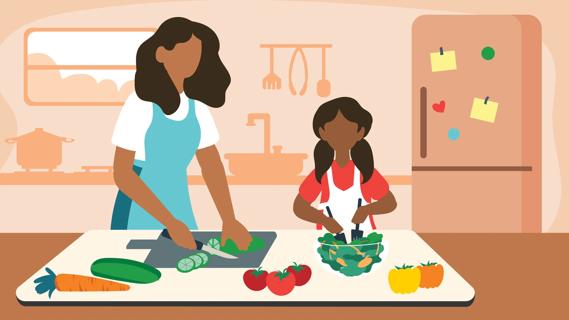 Caregiver and child preparing a salad together