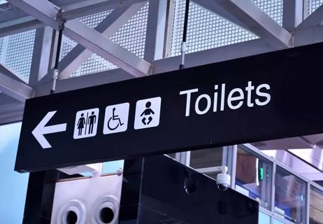 Sign for public restrooms at airport
