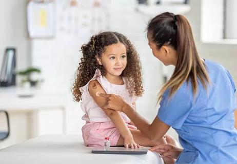 child getting vaccination