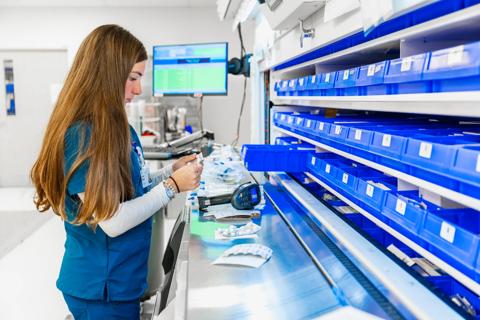 Pharmacist filling order