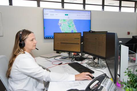 A nurse oversees the command center of Cleveland Clinic Florida's Hospital Care At Home program.