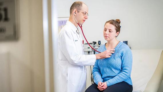 red blood cells floating around a DNA double helix