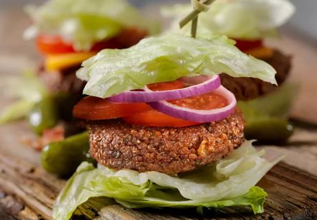 Veggie slider on a bun of lettuce