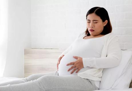 Pregnant woman experiencing some cramping