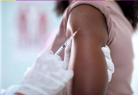 Photo of a patient receiving a flu shot.