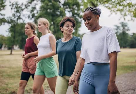 group of women walking outdoors