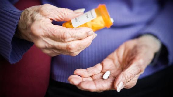 Older patient handling medicine