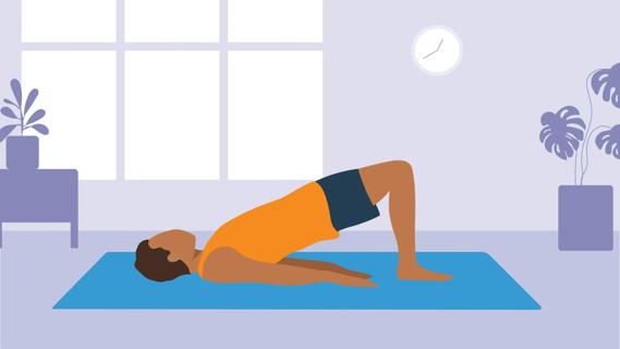 Person doing bridge pose on yoga mat