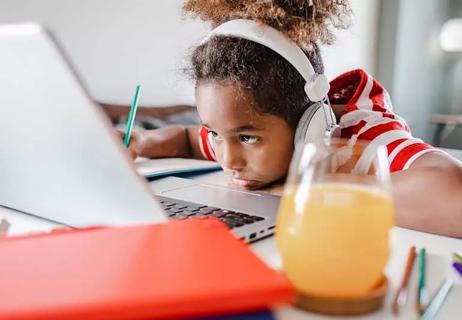 Child in front of computer
