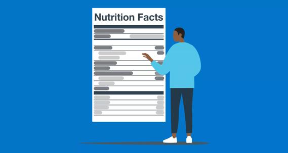 Person reading a nutrition label.