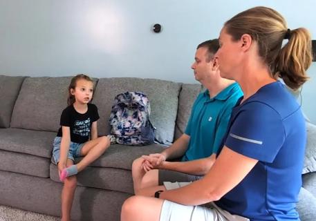 Parents talking to child