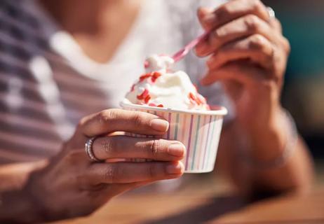 woman eating ice cream sundae
