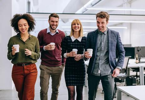 Coworkers walking in an office environment