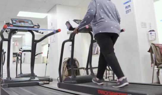 Woman walking on treadmill