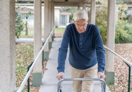 photo of old man with walker