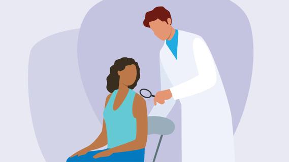 Healthcare provider checking patient's skin with magnifying glass