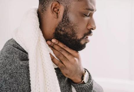 Man with sore throat