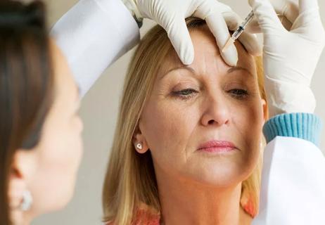 woman getting botox injection