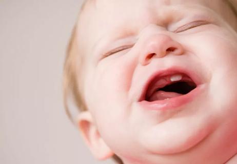 Teething baby crying