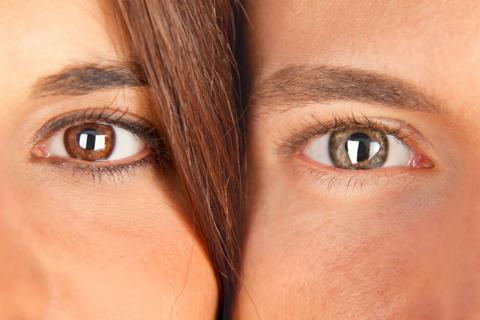 A woman's eye next to a man's eye