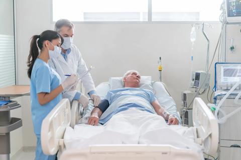 patient's blood pressure being checked