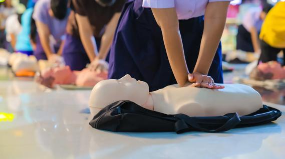 Children practicing CPR