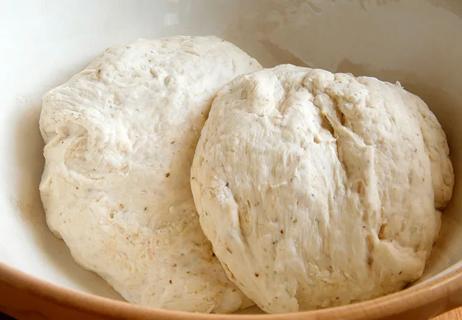 Balls of dough in a bowl.