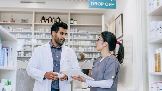 pharmacist talking with physician