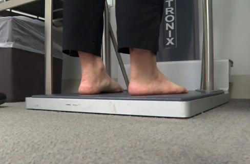 Person standing on scale