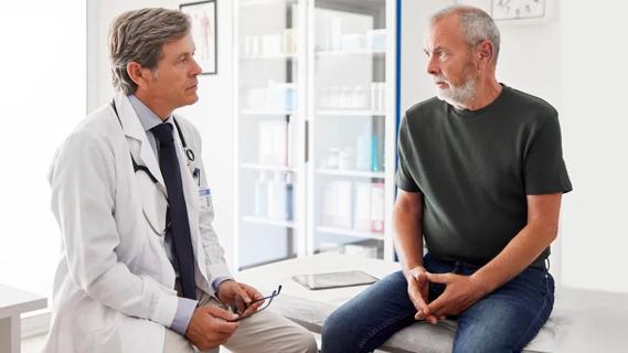 Male patient with doctor