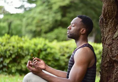 man taking deep breaths to calm down and think clearly meditate