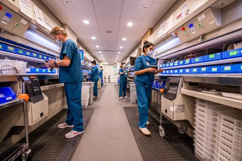 Caregivers rounding on a hospital unit