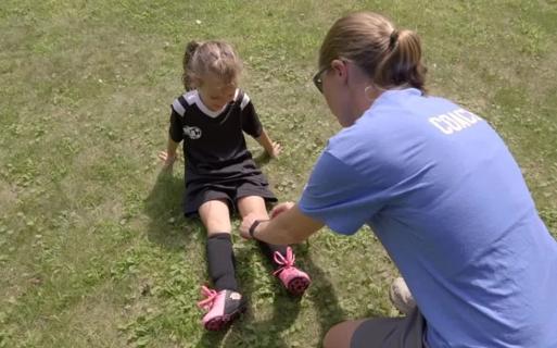 Child playing soccer