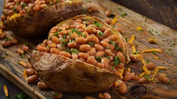 Baked potato topped with beans