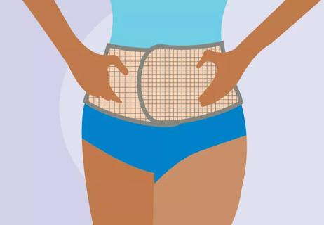 Person wearing a post pregnancy belly band.
