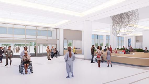 people in the spacious lobby of a medical building