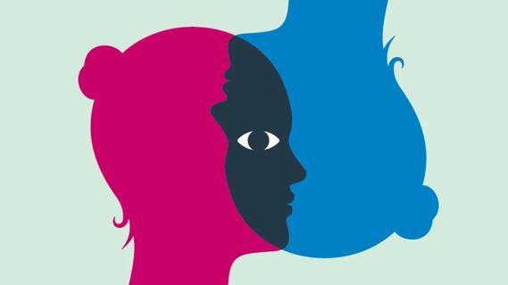 Pink silhouette (introvert) and upside down blue silhouette (extrovert) overlapping, with one eye open in middle