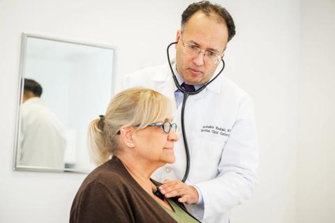 Dr. Hashmi with patient