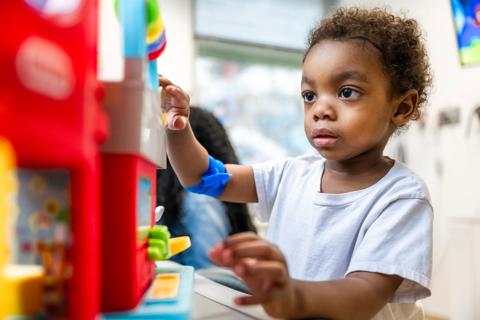 Child playing with toys