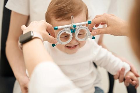 Young toddler having an eye examine