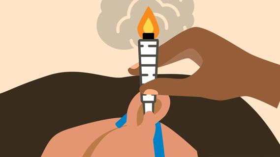 Person receiving ear candling